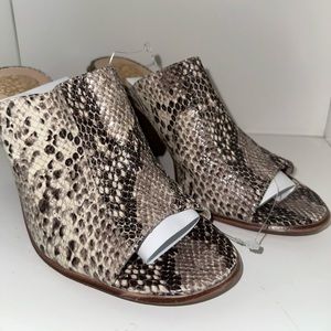 Vince Camuto snakeskin slides with 2 inch heel.